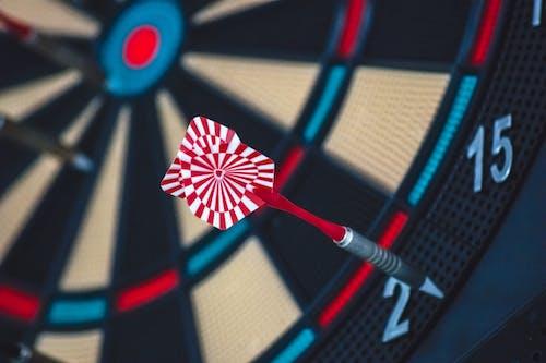Free Red and White Dart on Darts Board Stock Photo