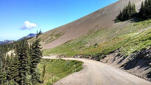 dirt road on the side of a mountain