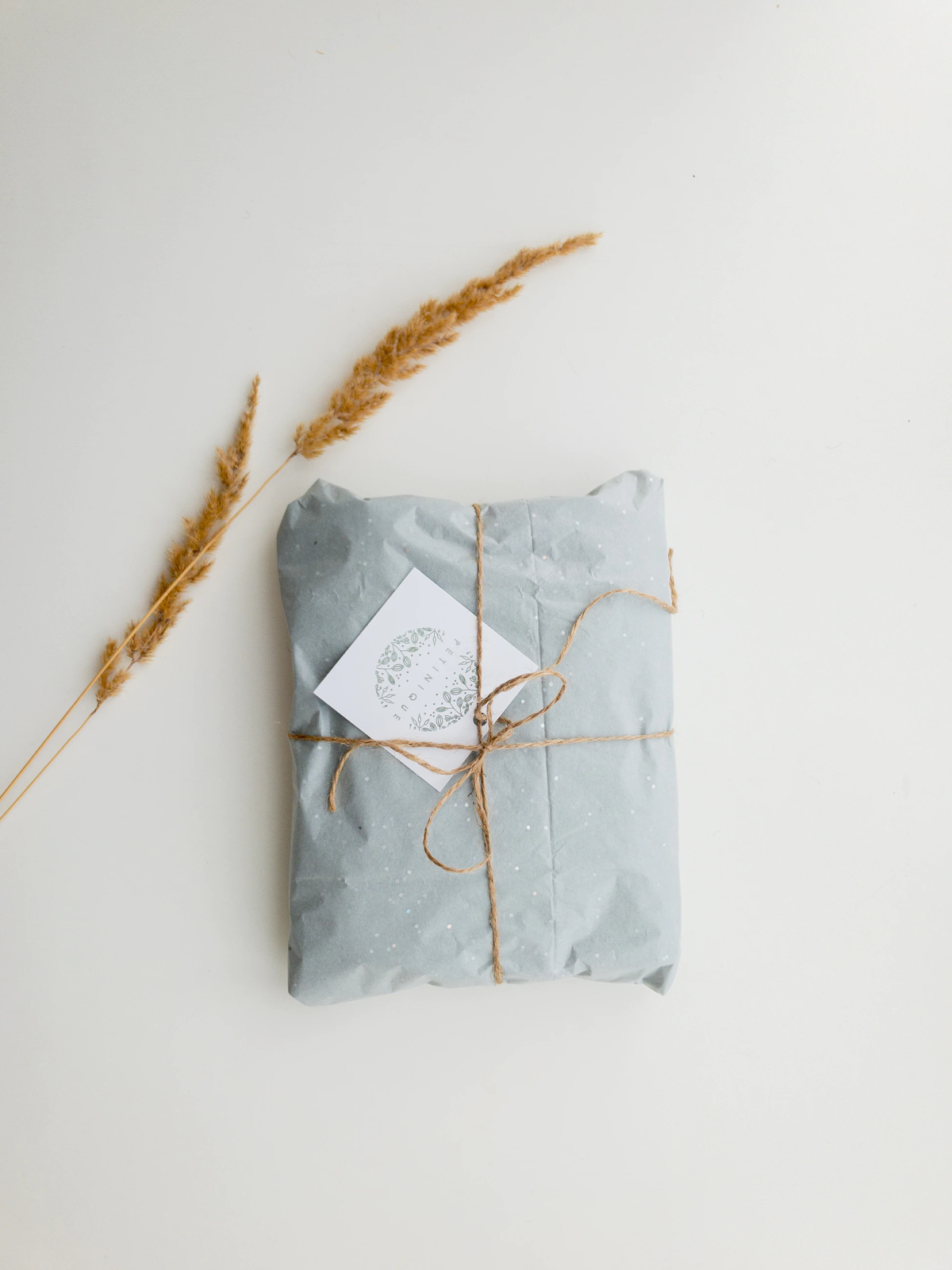 A blue textile-wrapped package for eco-friendly holidays.