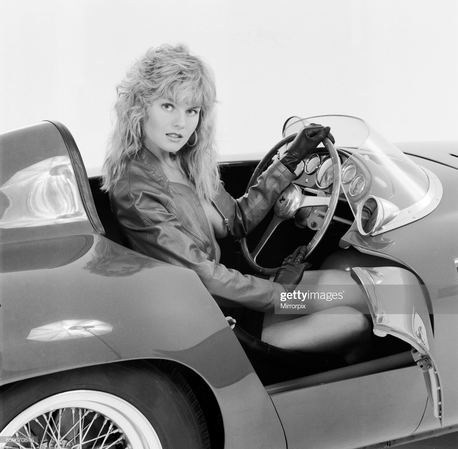 D:\Documenti\posts\posts\Women and motorsport\foto\1988\glamour-model-caroline-delahunty-poses-sitting-in-the-drivers-seat-of-picture-id859670846.jpg