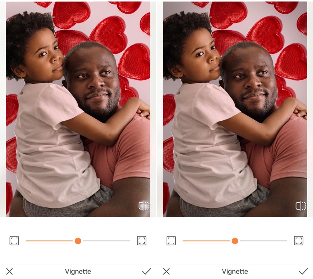 Foto de um pai negro segurando sua filha no colo sendo editada pelo AirBrush com a ferramenta Vinheta