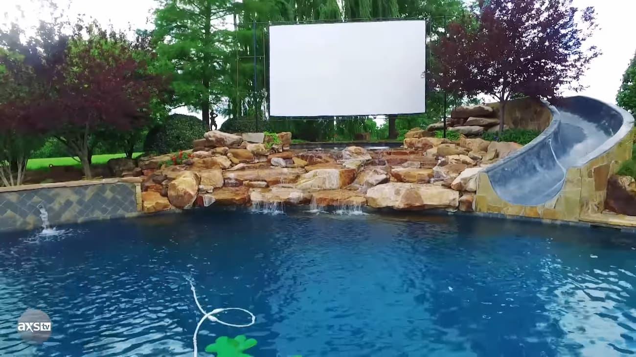 Swimming pool with a slide