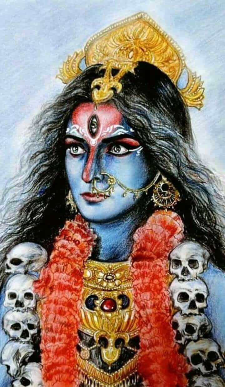 This image depicts Kali in a blue form wearing a garland of severed heads around her neck and a gold headpiece that resembles a tiara atop her head. 