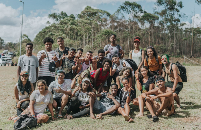 A group of people posing for a photo

Description automatically generated