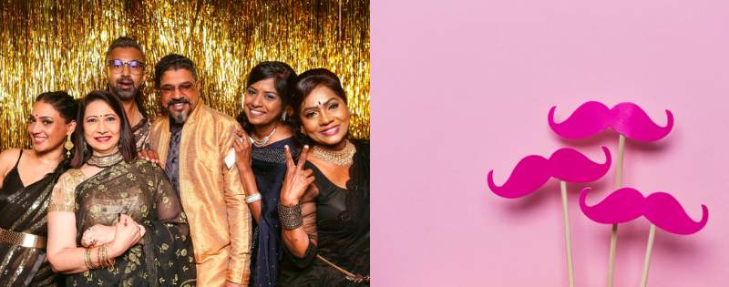 group of people with golden streamers in photobooth backdrop
