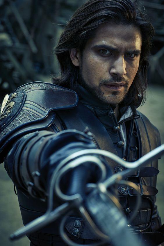 D'Artagnan in The Musketeers. I love this pose; his eyes are full of brooding while his sword arm is poised in patient readiness.: 