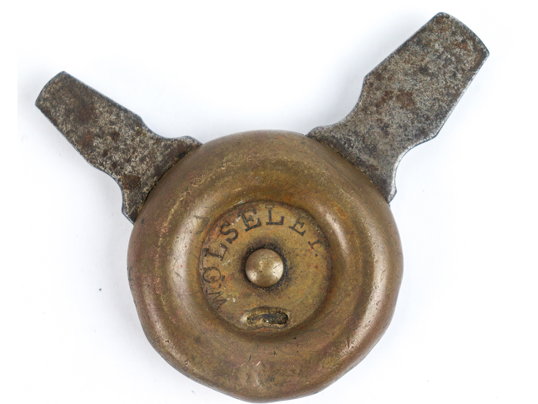 A Wolsley Sheep Shearing Company Screwdriver on a White Background. Brass and Metal with 'WOLSELEY' Impressed into the Center.