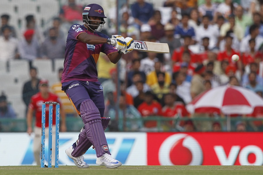 Thisara Perera playing a pull shot in a Rising Pune Supergiants jersey