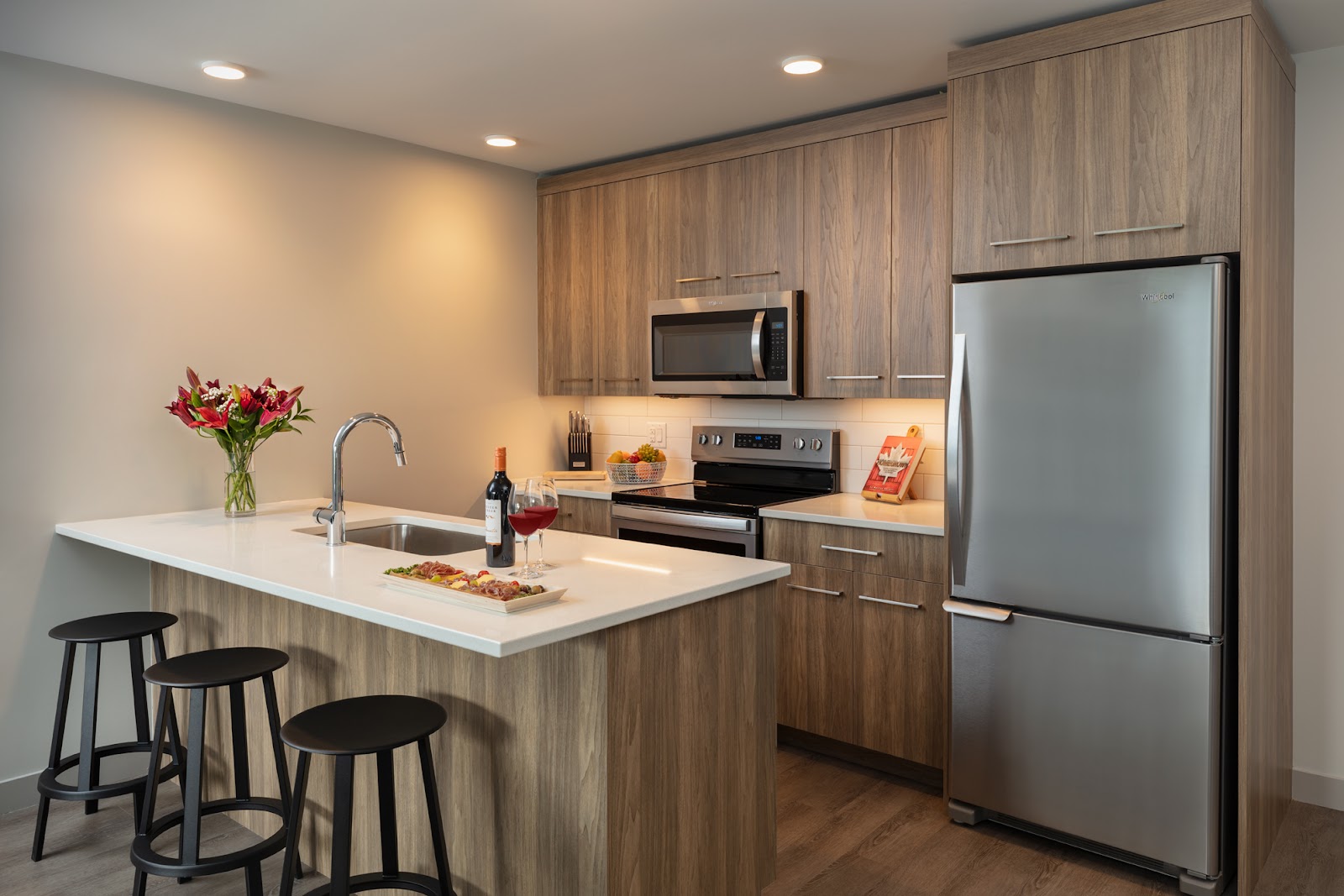 a suite kitchen at The Shore, furnished with modern appliances and space to cook groceries