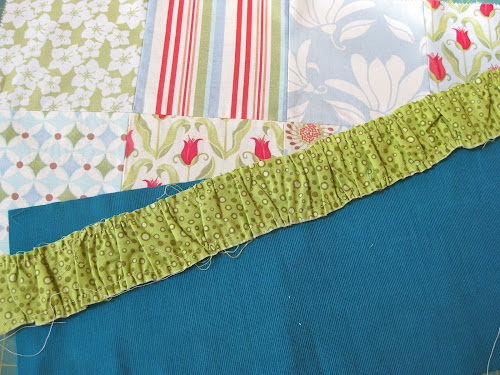 Pin the gathered strip of fabric to the charm packs which have already ...
