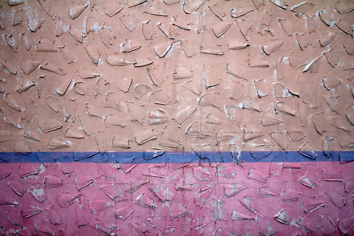 Image of a brown, purple, and pink wall.