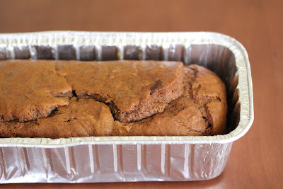 photo of a loaf of Banana nutella bread in a loaf pan