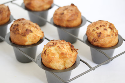 six bacon popovers in a popover baking pan
