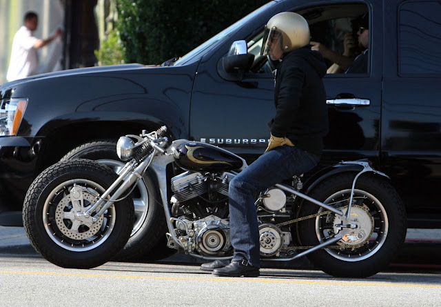 Brad Pitt riding a chopper