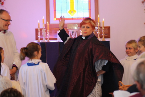 Liz swirls her chasuble