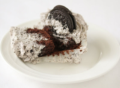 close-up photo of an oreo cupcake sliced in half