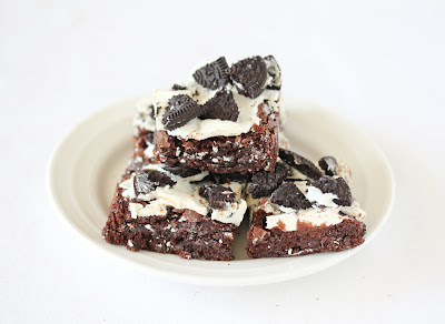 photo of a stack of oreo brownies on a plate