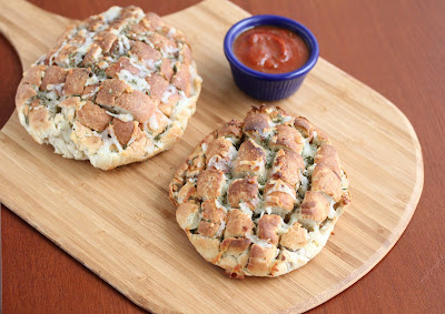 overhead photo of two pizza breads