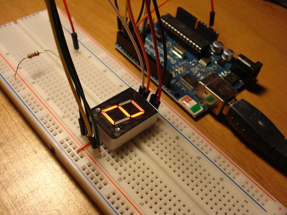 seven segment display counter connected to an arduino board