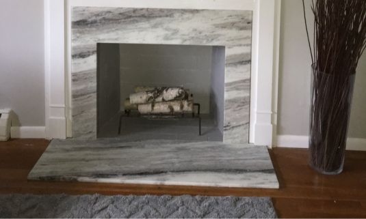 Fantasy Brown Marble fireplace surround 