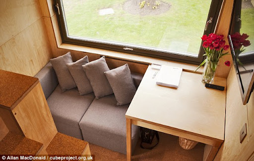 10ft cube home that includes a lounge, a shower, a kitchen and a DOUBLE bedroom 