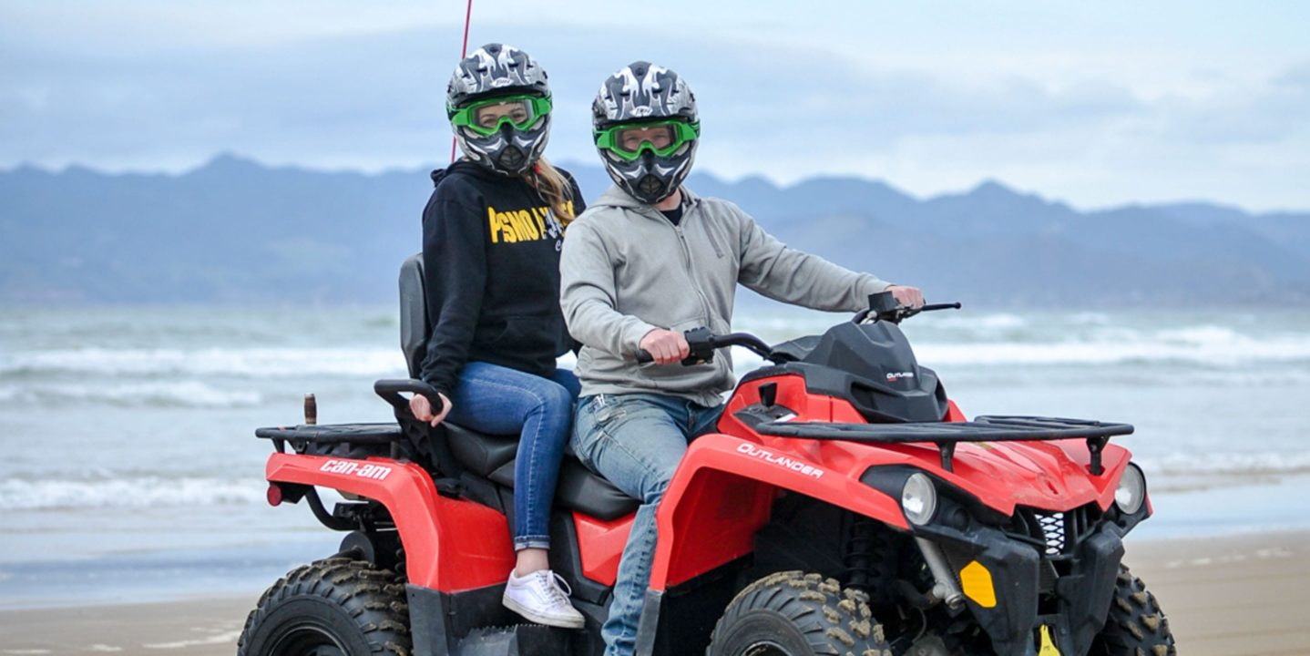 two people on an ATV