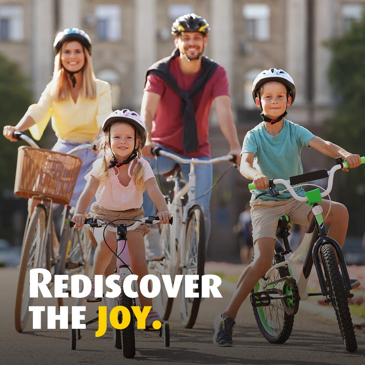 May be an image of child, riding a bicycle, bicycle, outdoors and text that says 'REDISCOVER THE JOY.'