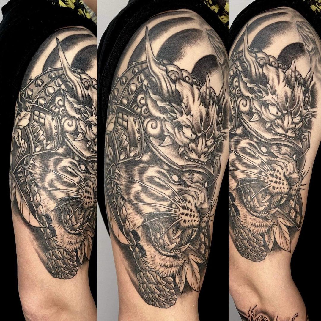 Angry Black Ink Tiger Ripped Skin Tattoo