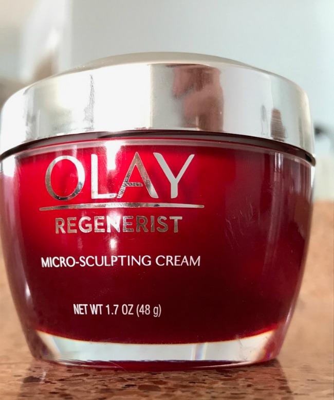 A close up of a jar on Olay Regenerist Cream.