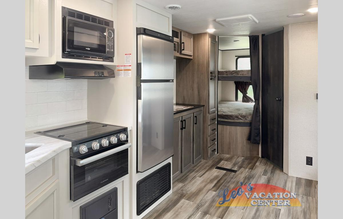 The compact kitchen gives you everything you need to make dinners for your crew.