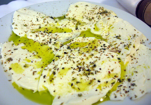 Whole milk mozzarella made from cow's milk with extra virgin olive oil and freshly cracked black pepper