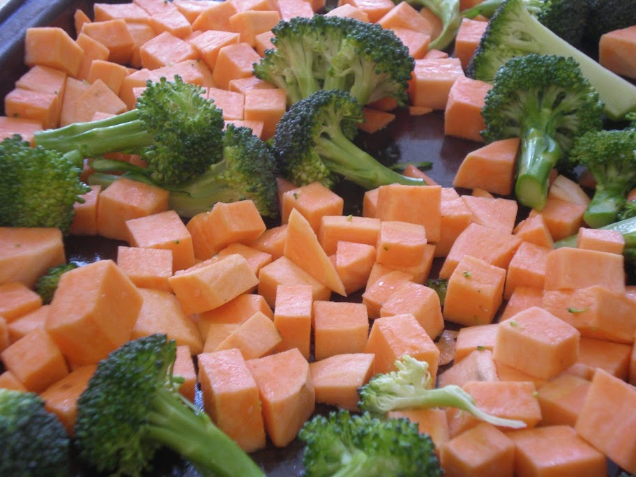 Broccoli and sweet potato cut to size so that they are both done in fifteen minutes spent in a 475F oven.