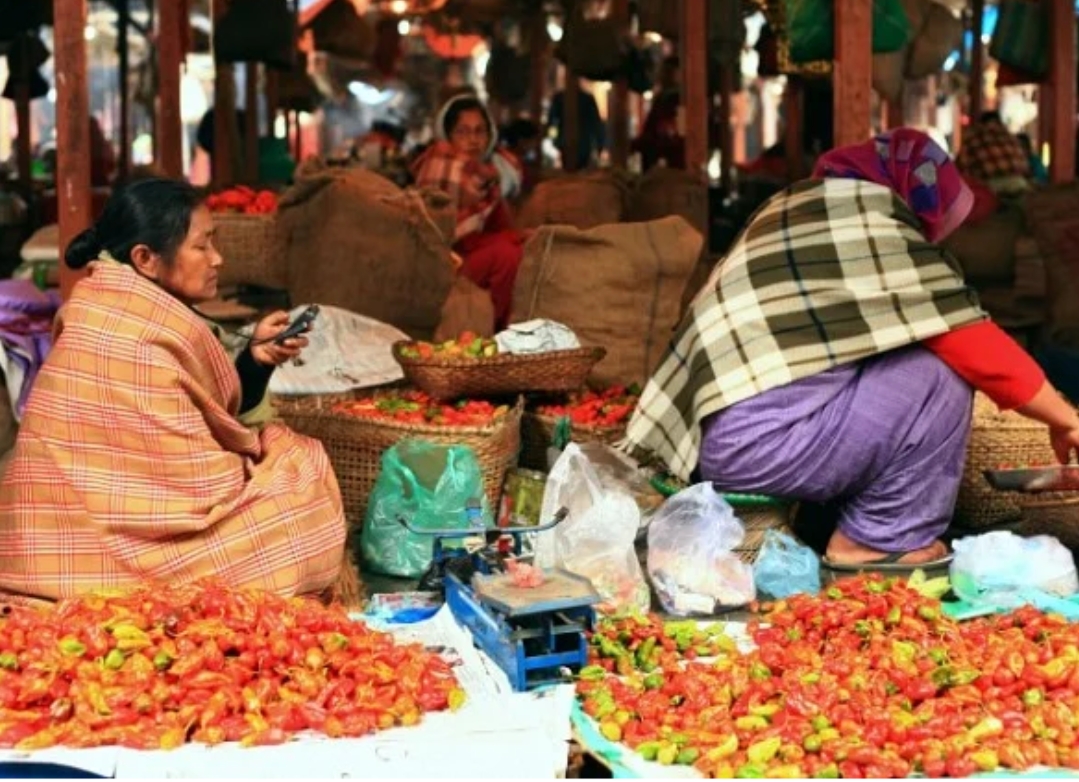 (Women of the East selling more chilies)
