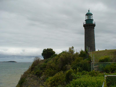 Queenscliff’s black stone lighthouse and distant Point Nepean