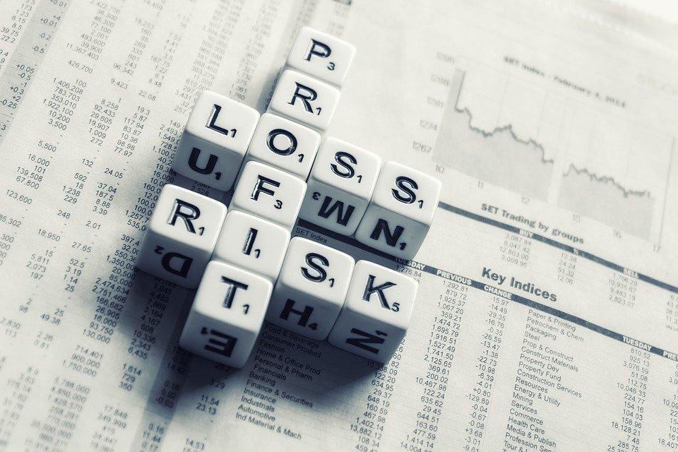Dices Over Newspaper, Profit, Loss Risk, Wall Street