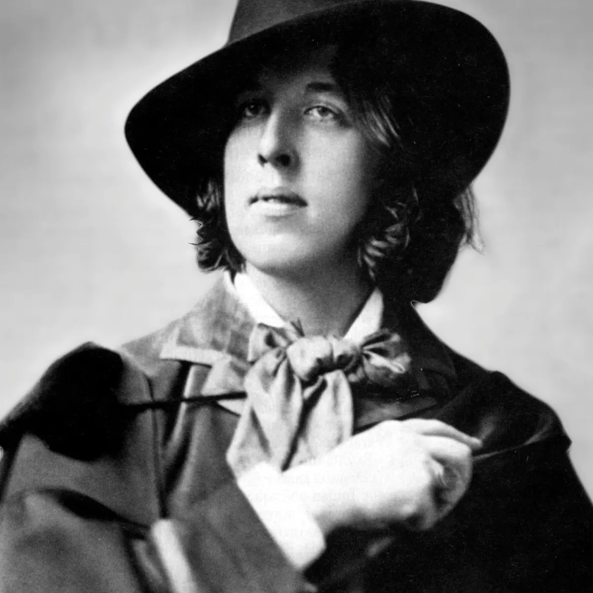 Oscar Wilde dressed in what was considered to be "flamboyant" attire at the time