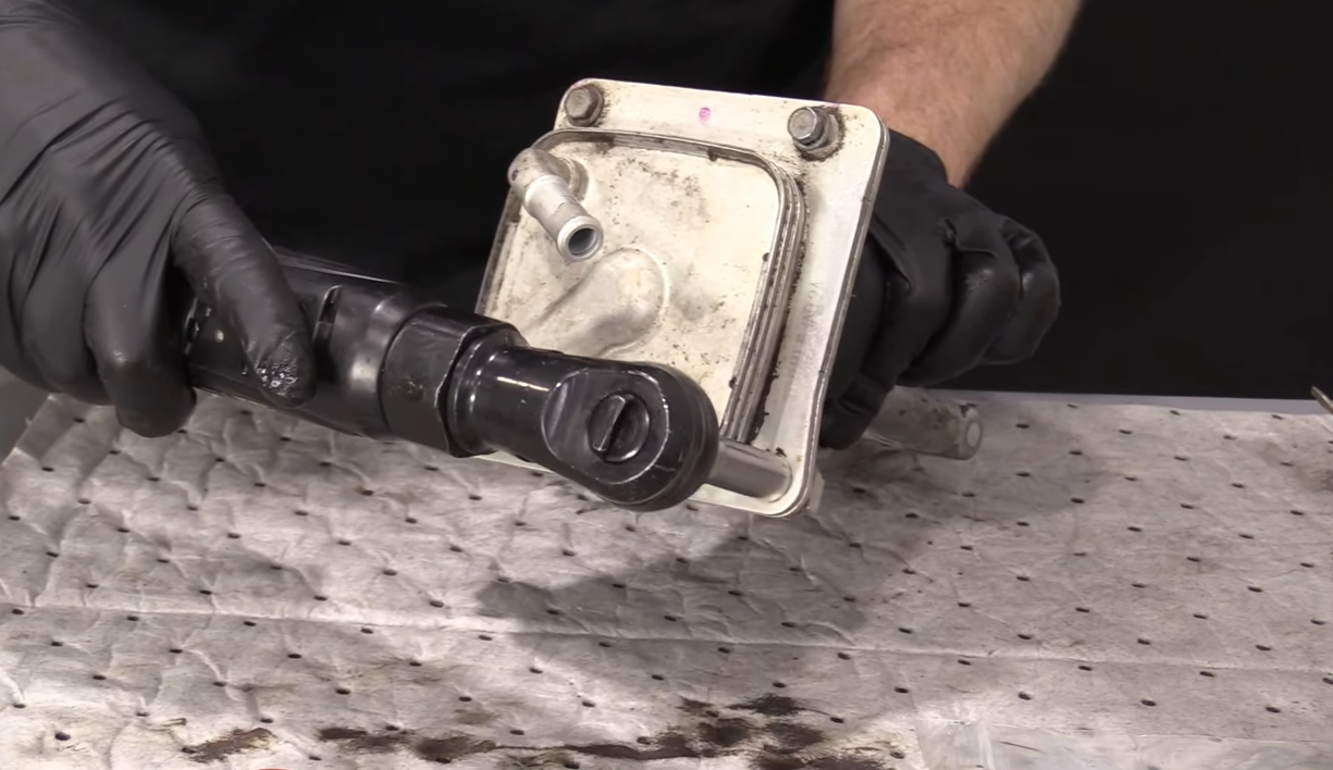 replace the unit on the oil cooler
