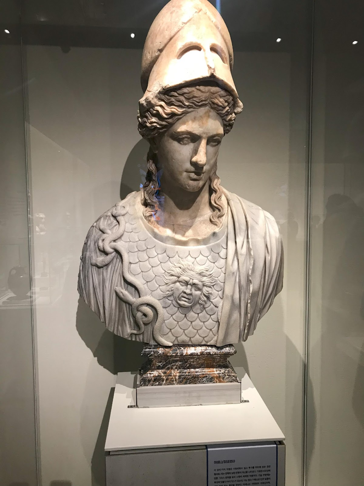 A statue of a person in a museum

Description automatically generated with low confidence