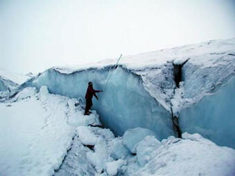 Peter Haeussler measuring offset snowpack caused by the M7.9 Denali, Alaska earthquake on November 3, 2002.