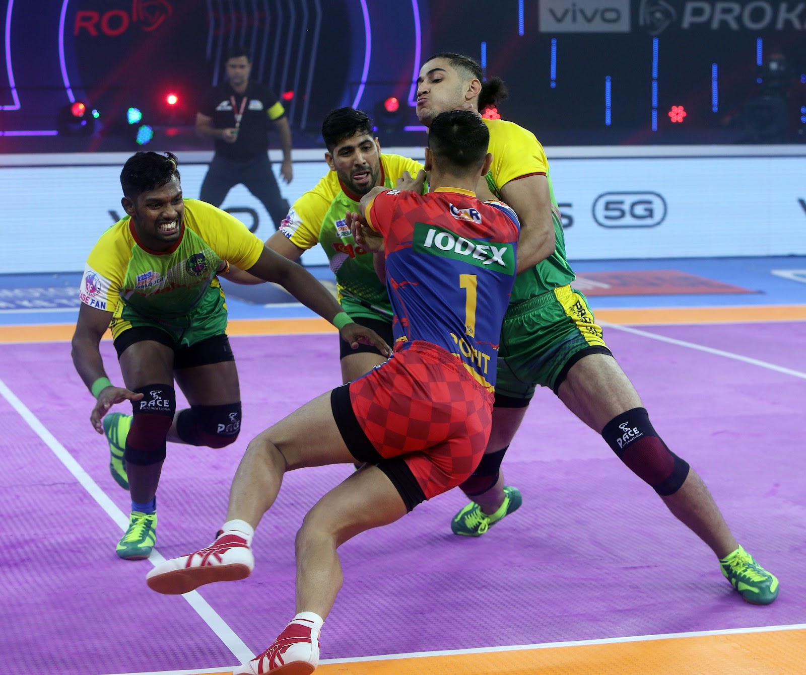 Patna Pirates' defenders try to trap a UP Yoddha raider