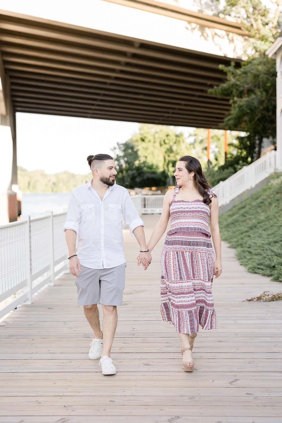 Couple holding hands walking