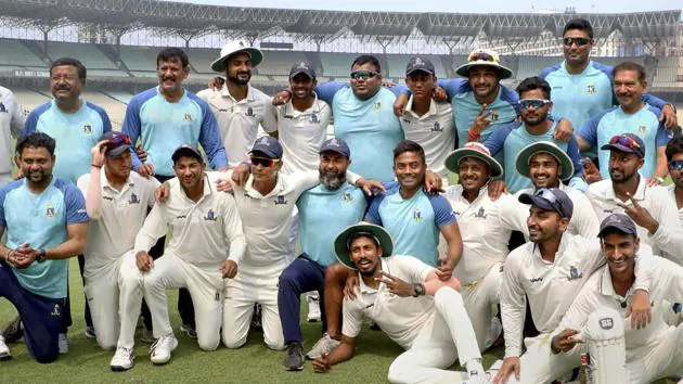 Bengal players enjoy after winning over Baroda 