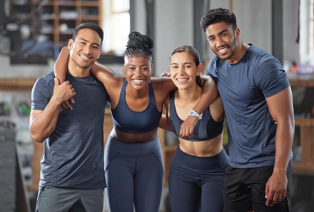 Premium Photo | Fitness exercise and diverse accountability group standing  together and looking happy after training at gym portrait of friends  enjoying their membership at a health and wellness facility
