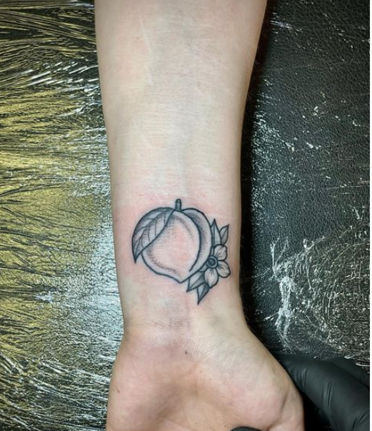 Peach Wrist Tattoo 