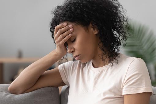 https://media.istockphoto.com/photos/african-woman-sitting-on-couch-feels-unhappy-having-problems-picture-id1186418426?b=1&k=6&m=1186418426&s=170667a&w=0&h=Hw1bC8_qwuFgNF7dnphuJclXy4LZEXE_Qh294G2q85A=