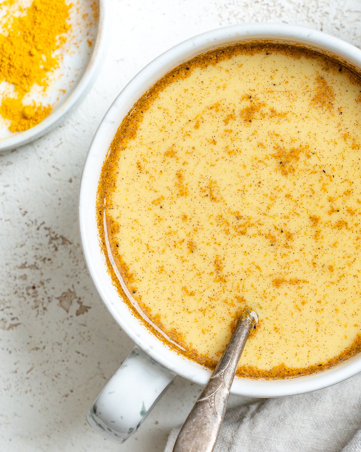 completed Dairy-free Golden Milk in a cup against a light background