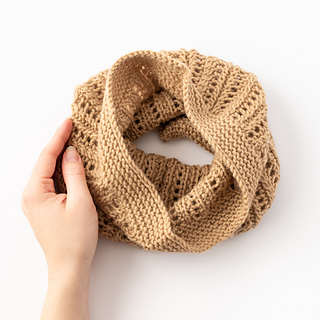 lace cowl lying on white background