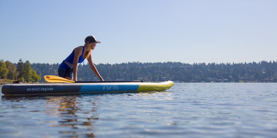 Van Dragt 091517 0067 stand up paddler wading into water