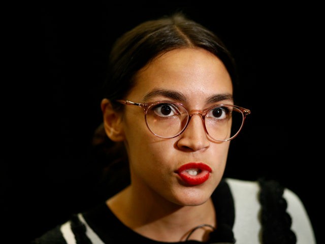 New York congressional candidate Alexandria Ocasio-Cortez speaks with reporters after participating in a town hall with Kerri Evelyn Harris, Democratic candidate for U.S. Senate in Delaware, Friday, Aug. 31, 2018, at the University of Delaware in Newark, Del. (AP Photo/Patrick Semansky)