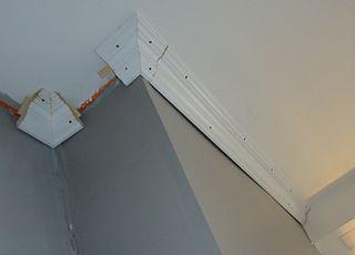 Description: http://upload.wikimedia.org/wikipedia/commons/thumb/2/2c/Kitchen_renovation_9a_crown_molding_being_installed_with_corner_pieces.JPG/320px-Kitchen_renovation_9a_crown_molding_being_installed_with_corner_pieces.JPG